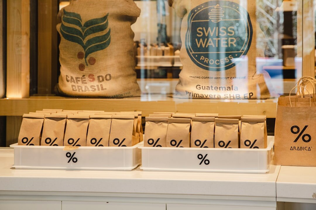 a store window with bags of coffee on display