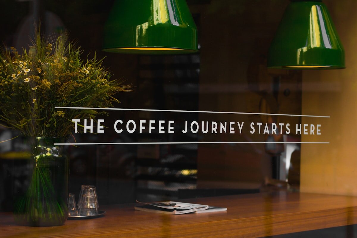 A freshly poured latte on a cafe table